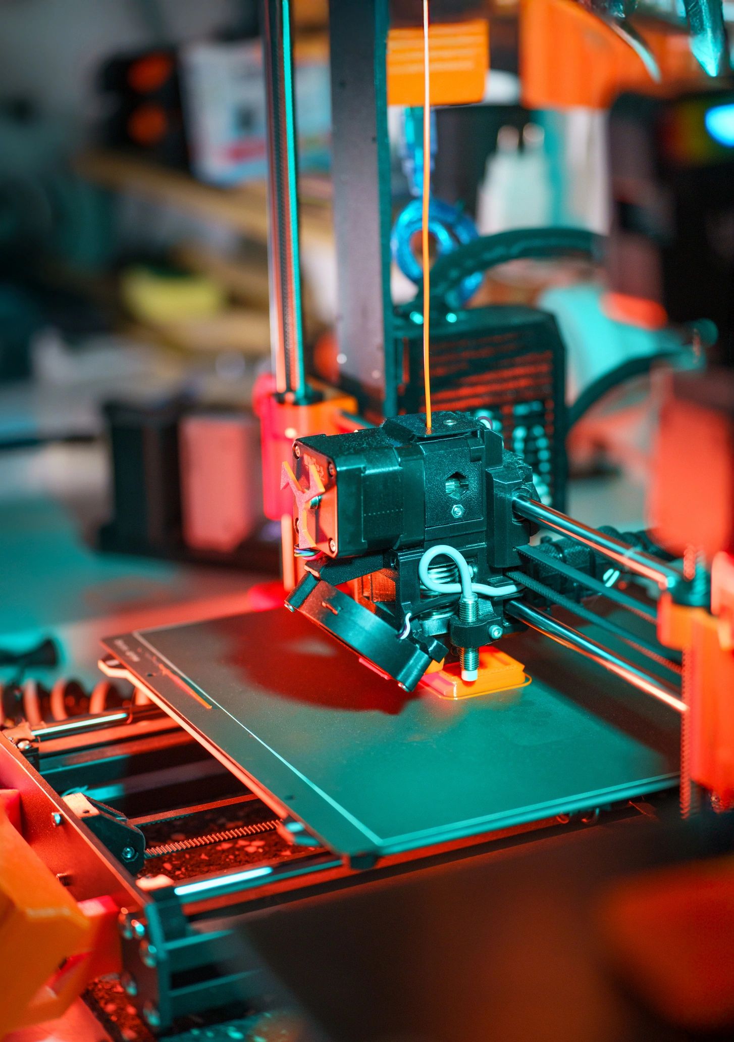 Finished personalized 3D printed gifts displayed on a table